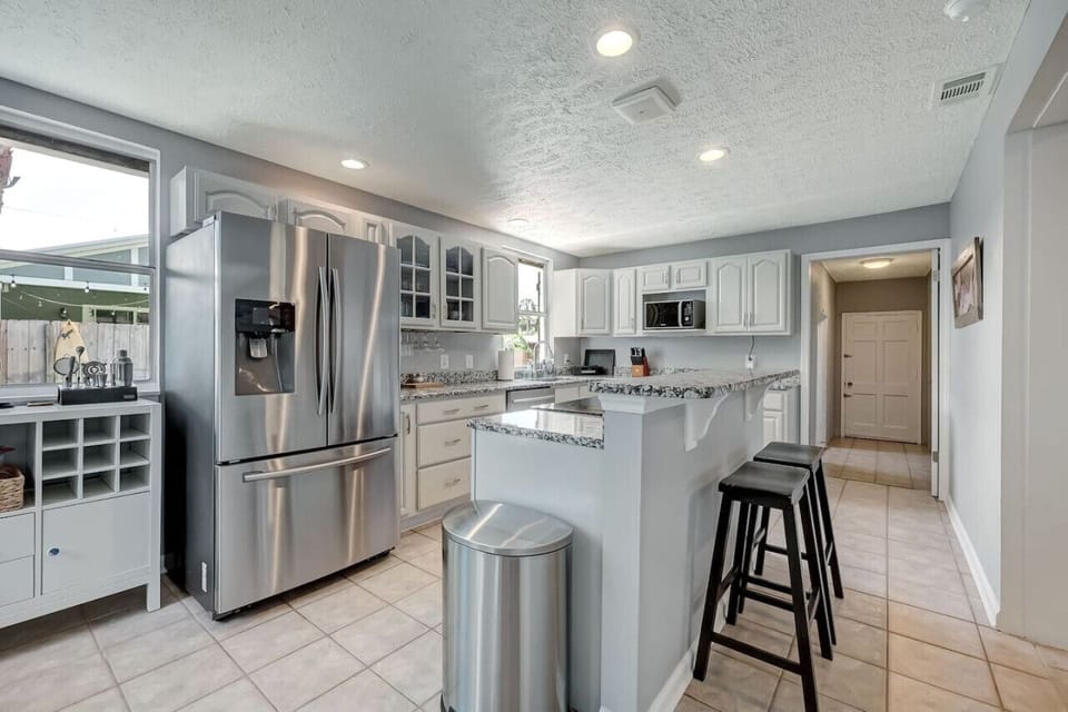 Recently renovated kitchen has all SS appliances and granite countertop