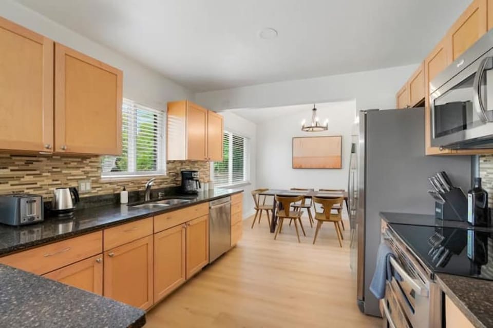 Open concept style view room kitchen towards dinning room