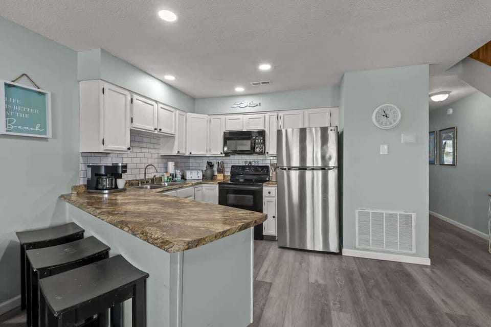 We've stocked this kitchen with full appliances, dishes, bake ware, pots & pans, silverware, utensils, crockpot, blender, and a traditional coffee maker & Keurig.