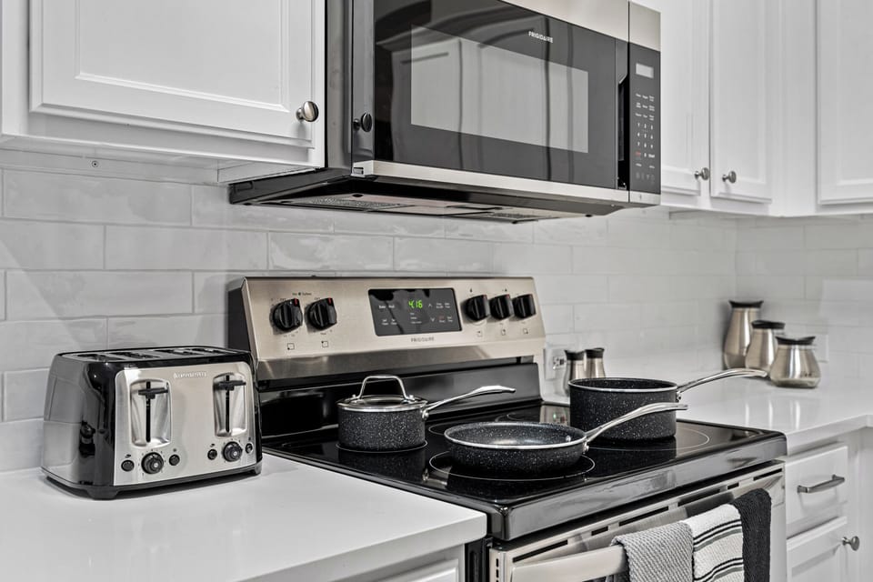 Ideal for families and extended stays, this bathroom provides the convenience and comfort guests need during relocation or work housing.