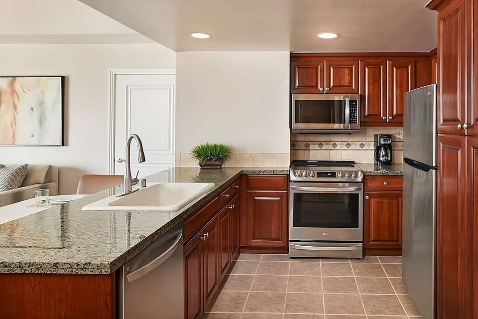 Cook full dinners with stainless appliances and generous counter space.