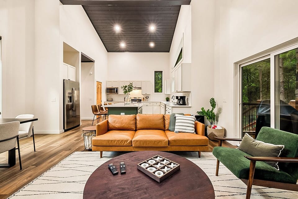 LIVING ROOM | Leather sofa, Accent Chairs, TV and gas fireplace