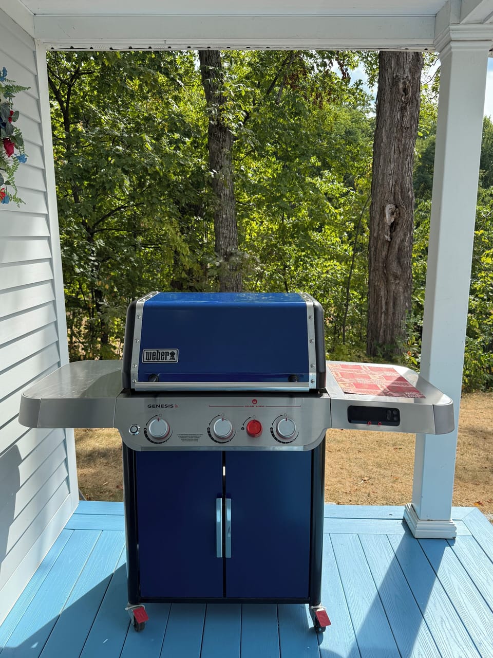 Grill connected to propane tank