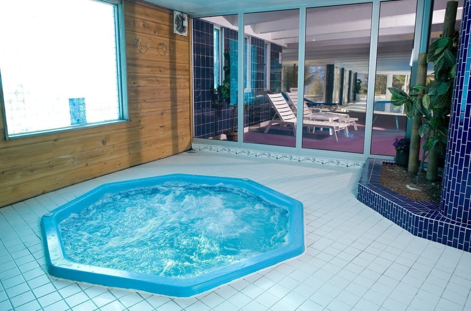 Soak sore muscles in the indoor hot tub.