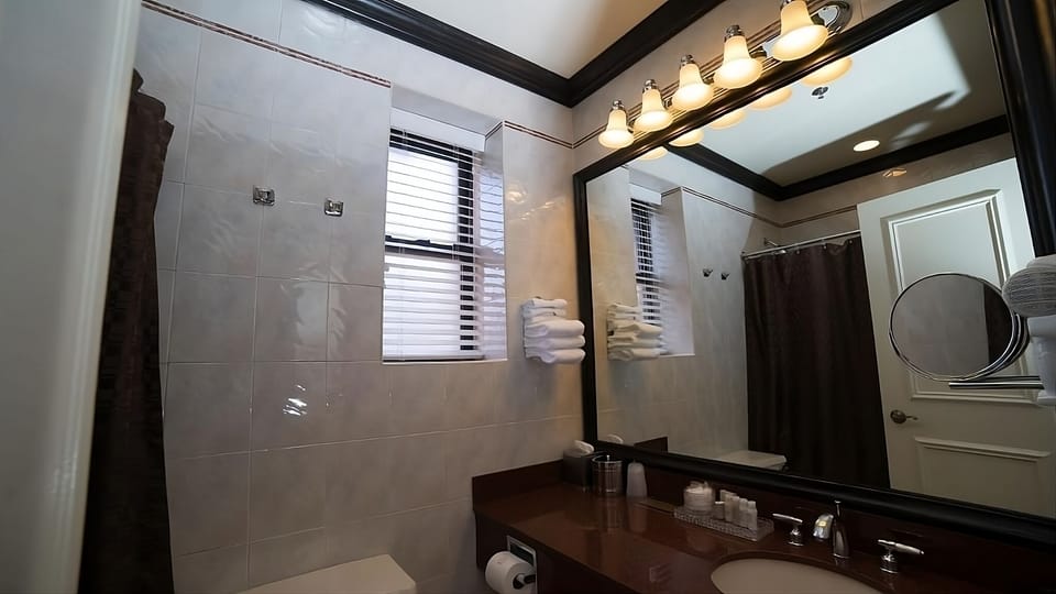 Get ready easily under bright lights with a wide mirror.