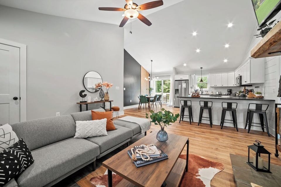 Living room opens into kitchen and dining area.