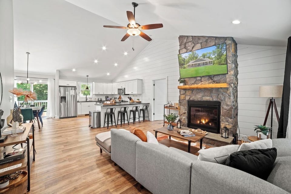 Large open living area with vaulted ceilings is the perfect place to gather with family and friends.