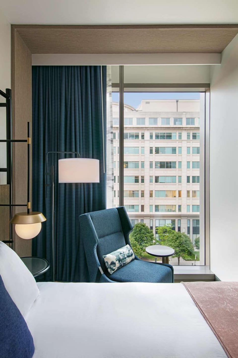 Lounge by the window and watch the city drift by.