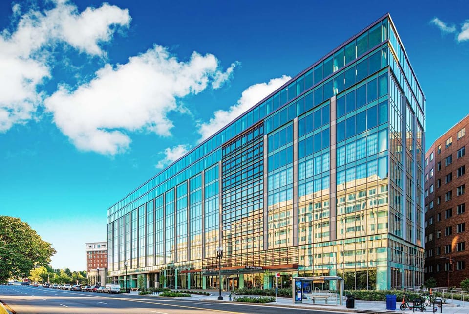 Arrive in style at this sleek, glass-front urban hotel.