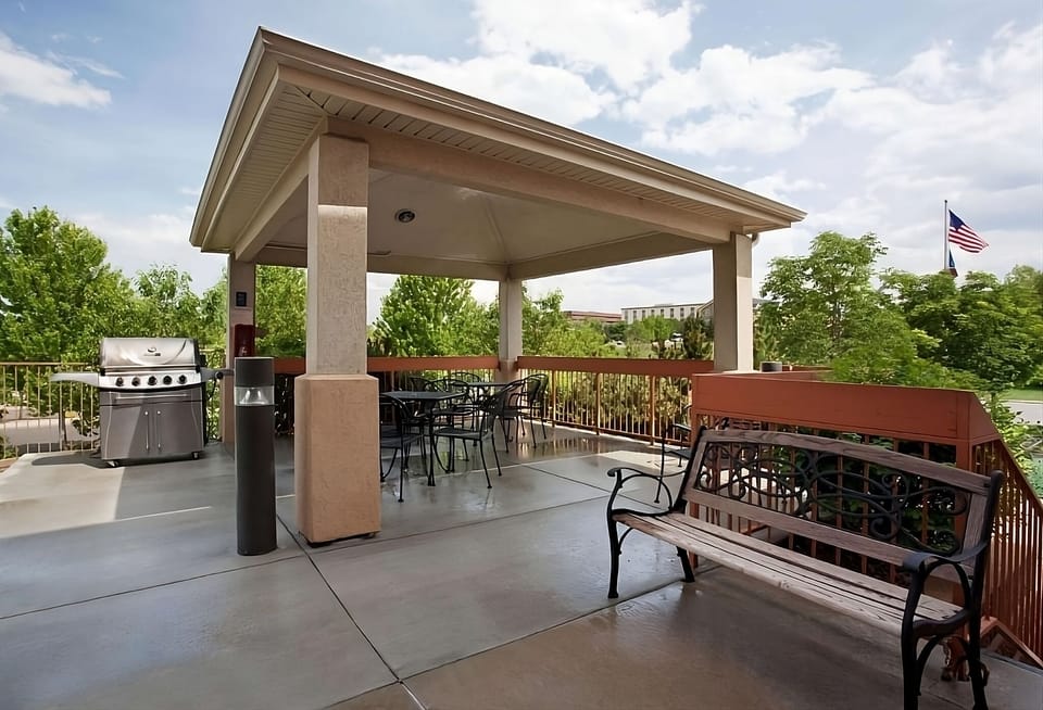 Gather for breezy meals and sunsets on the covered patio.