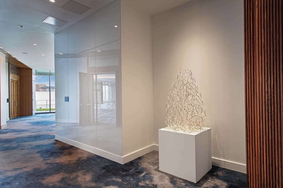 Stroll through gallery-like halls with thoughtfully curated sculpture.