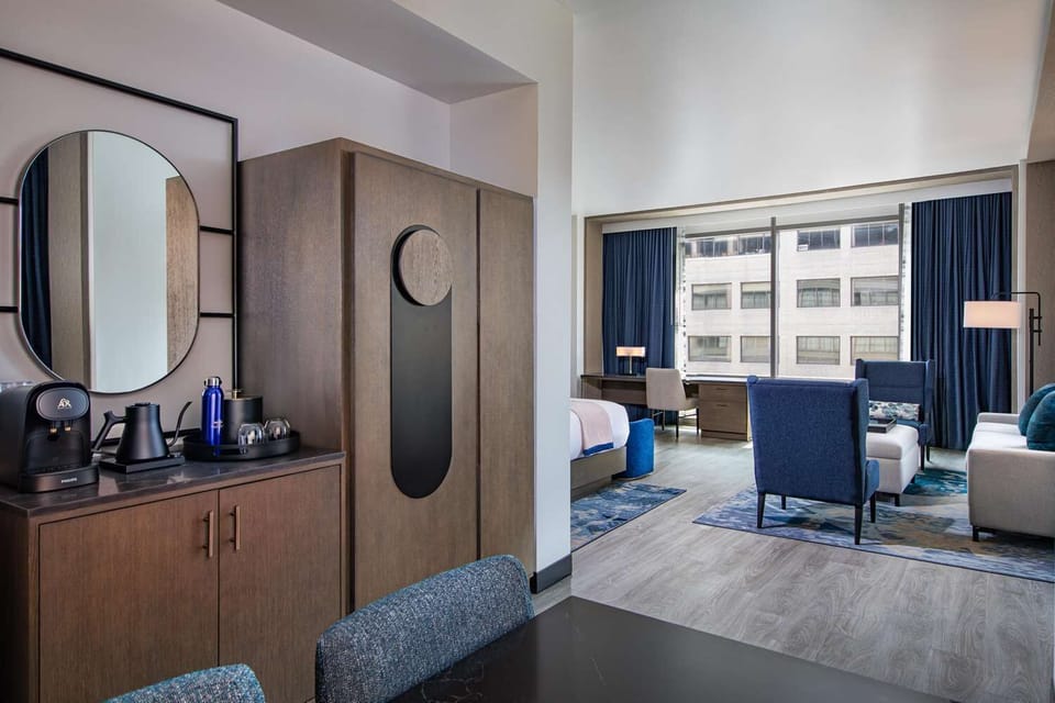 Start mornings with in-room coffee and sleek storage.