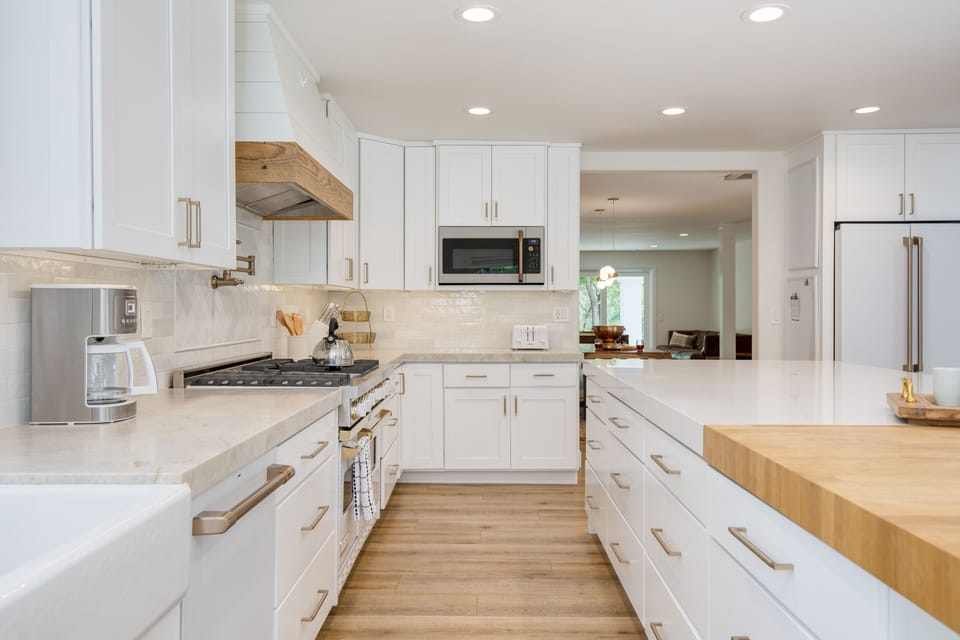 Modern appliances, including a gas range.