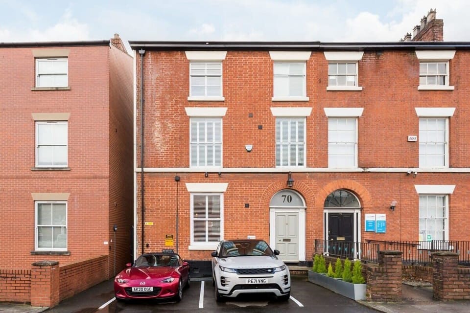 Front elevation of building with parking (more at rear)