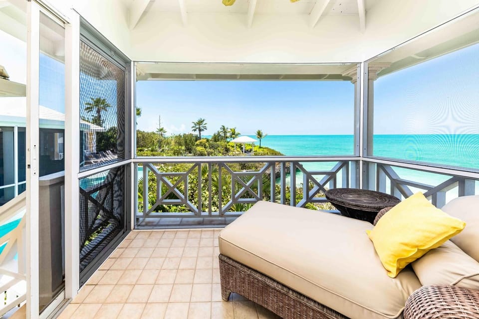 The screened balcony located off the master bedroom.