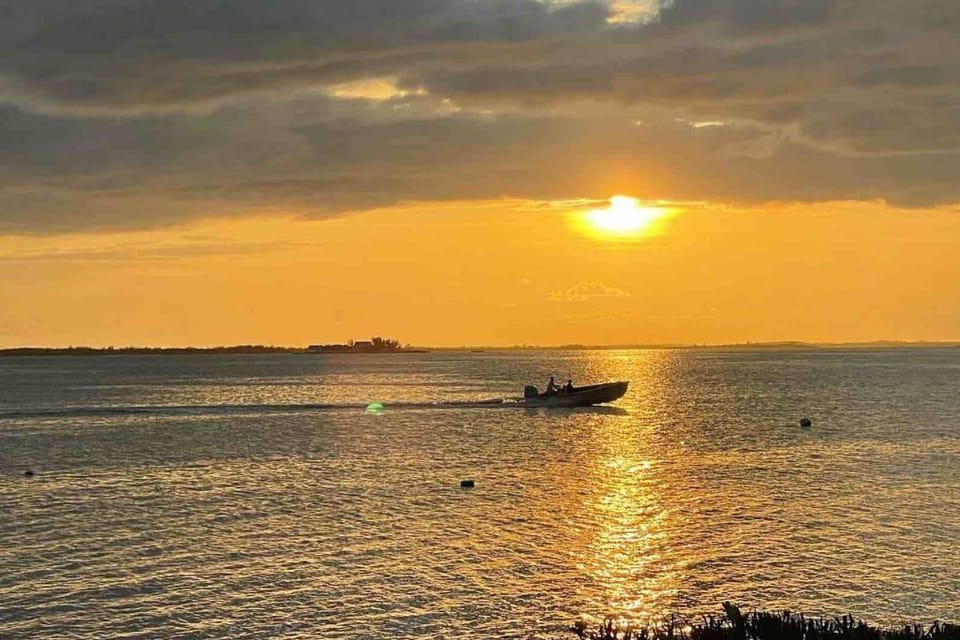 Sunset from the front of the house, looking west across the harbour.