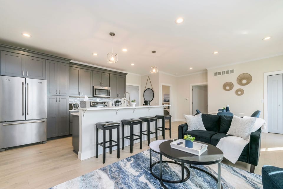 Savor the joy of culinary delights at our inviting open kitchen and stylish bar counter.