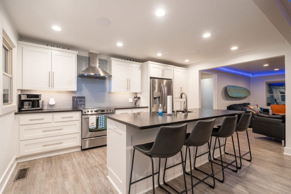 The Modern Kitchen is Well Equipped with Stainless Steel Appliances