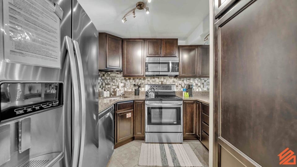 Featuring stainless steel appliances and plenty of counter space.