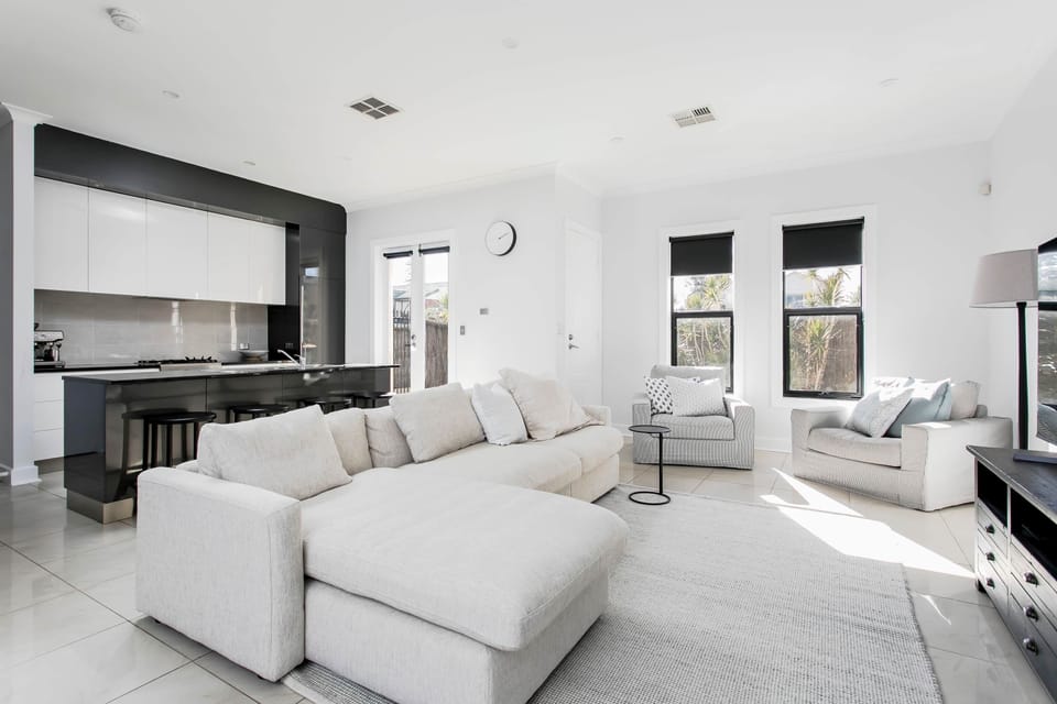Lounge Room - downstairs off kitchen with large sofa and smart TV