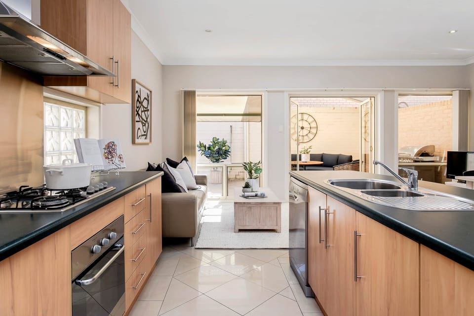 Kitchen - full kitchen with direct access to the living, dining and alfresco areas