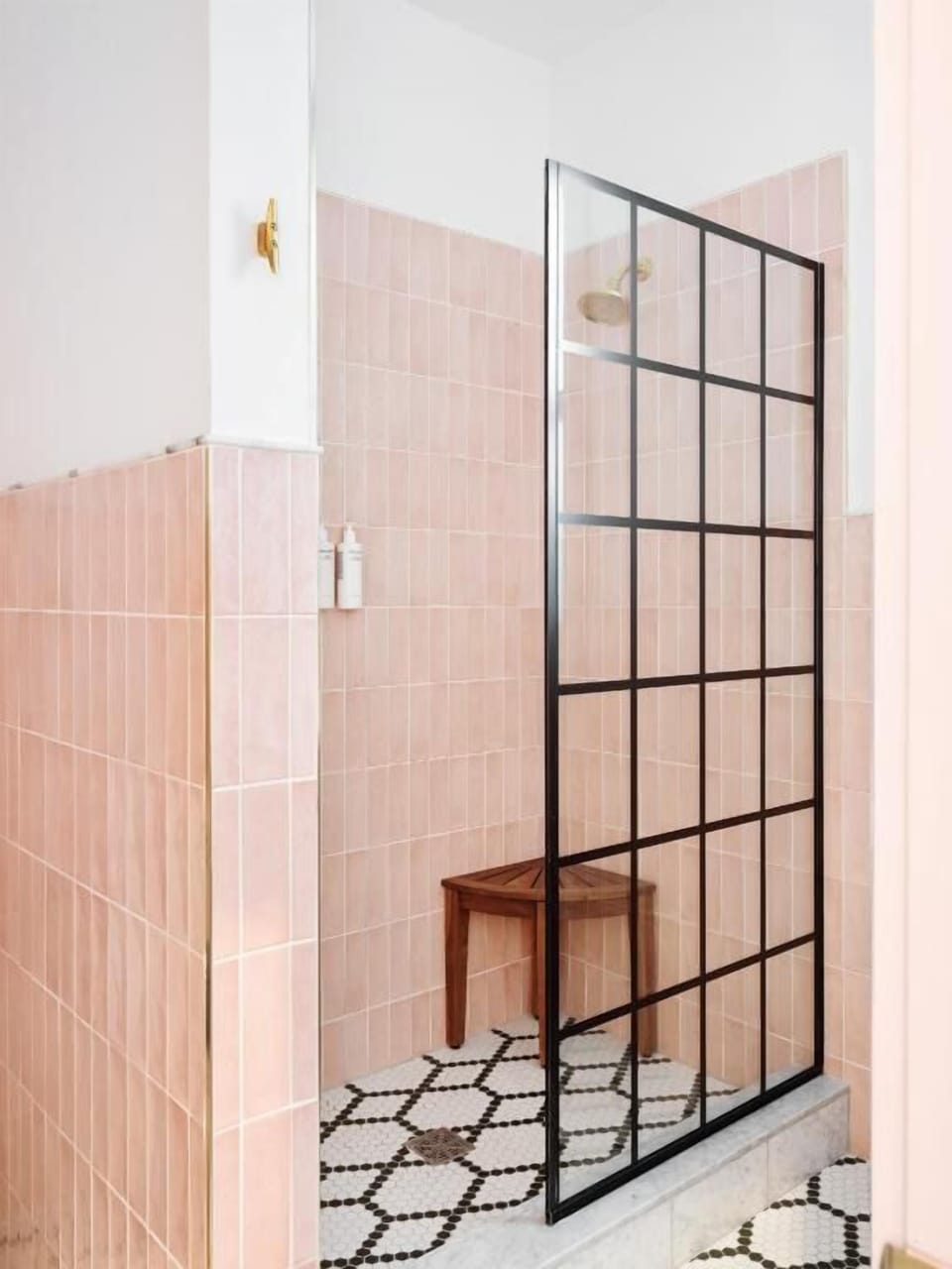 Refresh in a chic tiled shower with spa-like calm.