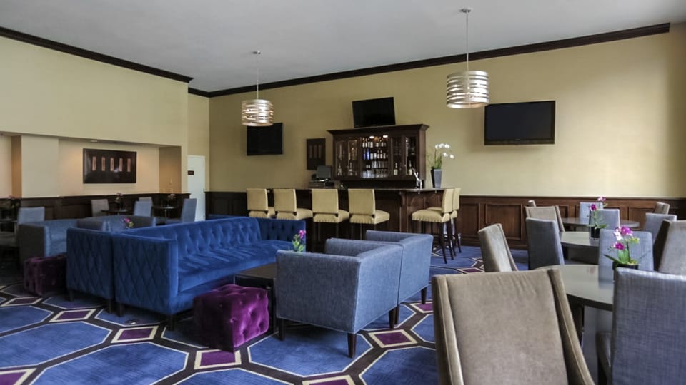 Linger over conversation in a spacious lounge with comfortable seating.
