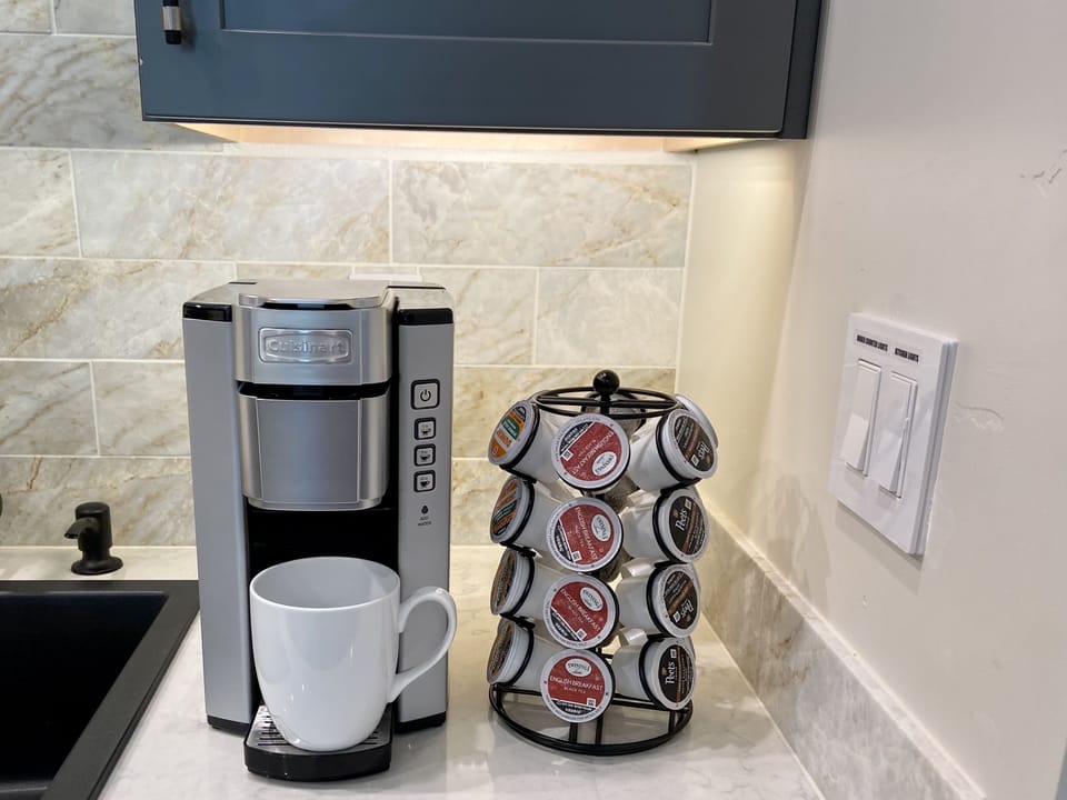 An assortment of free caf and decaf coffees and breakfast tea for your mornings