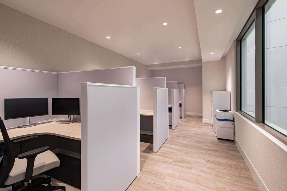 Settle in and focus with quiet, well-lit private workstations.