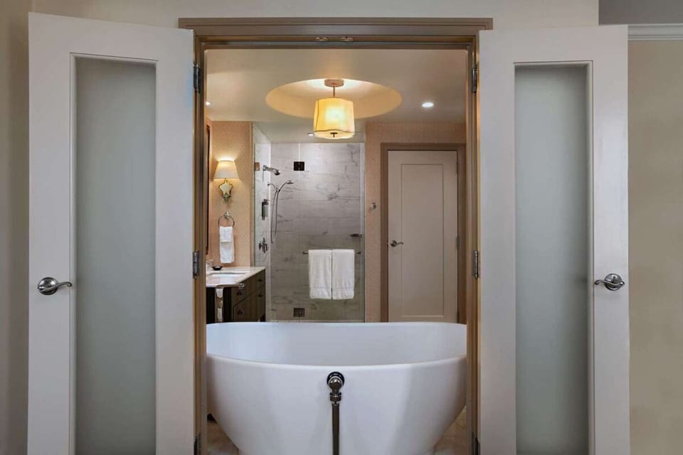 Step into a spa-like bath with a deep soaking tub.