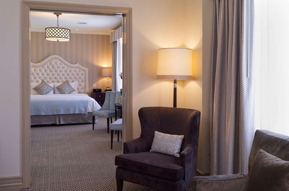 Lounge by the window, then drift into the serene bedroom.