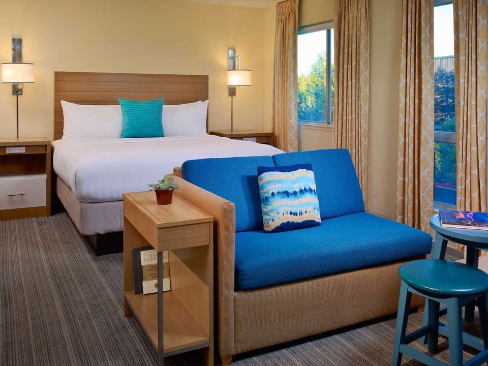 Sink into a serene room designed for deep, restful sleep.