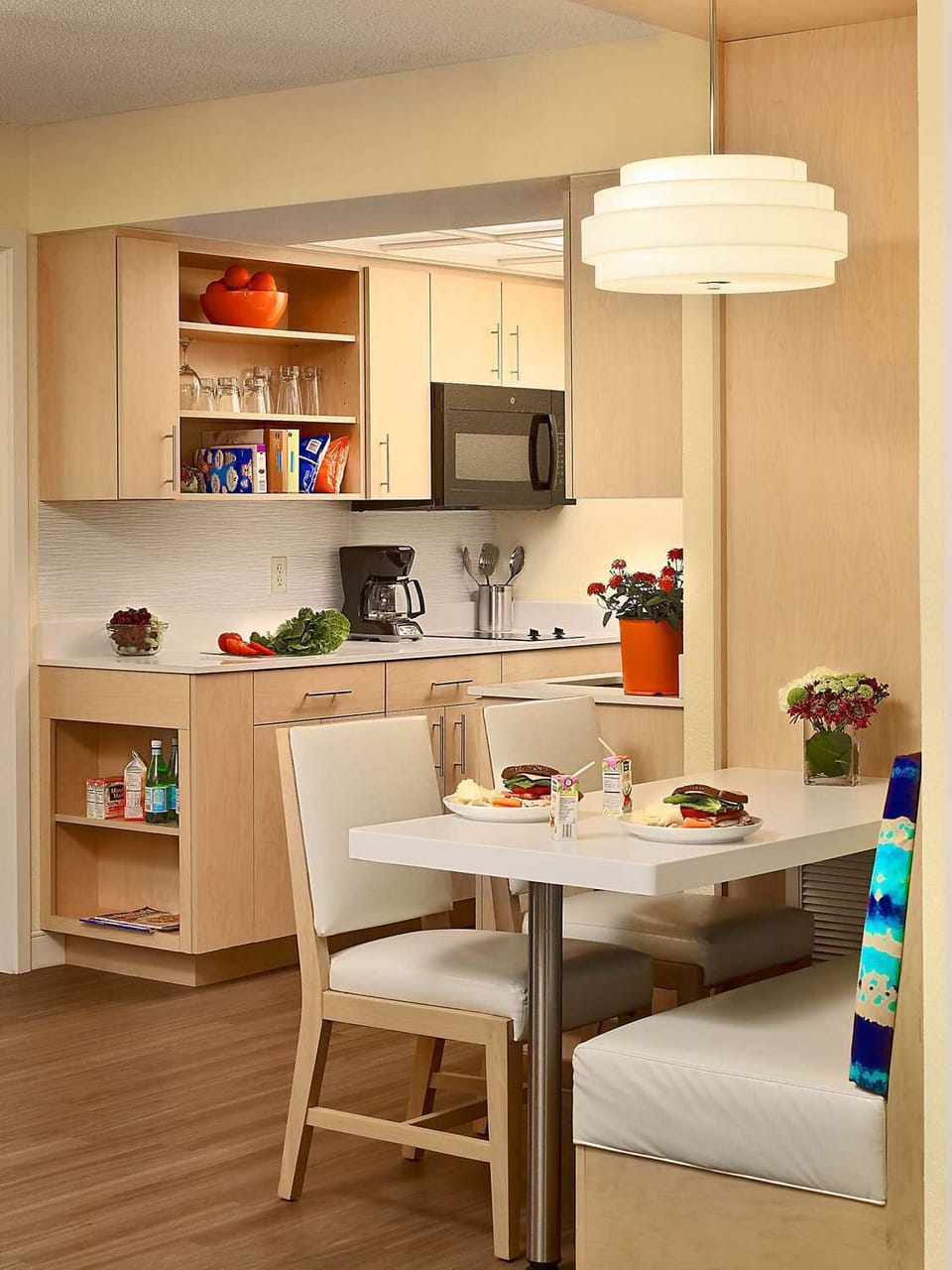 Gather for easy meals at the cozy in-suite table.