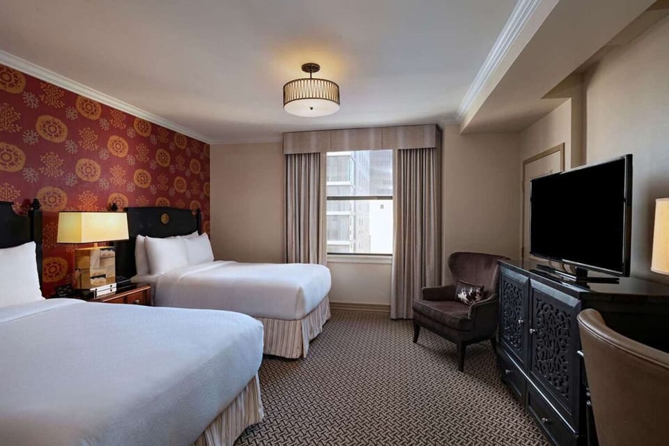 Unit with 2 Double size beds. Exact unit will be assigned upon arrival. Views, colors and decor may vary.
