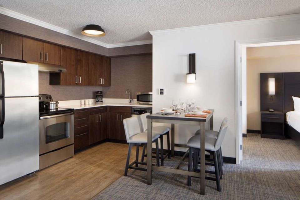 Settle in with a full kitchen and cozy dining nook.