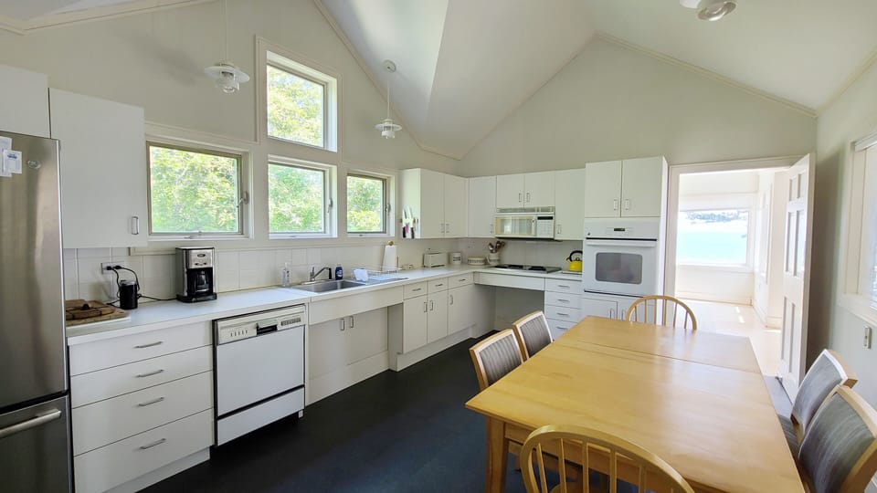 Eat in kitchen with vaulted ceiling