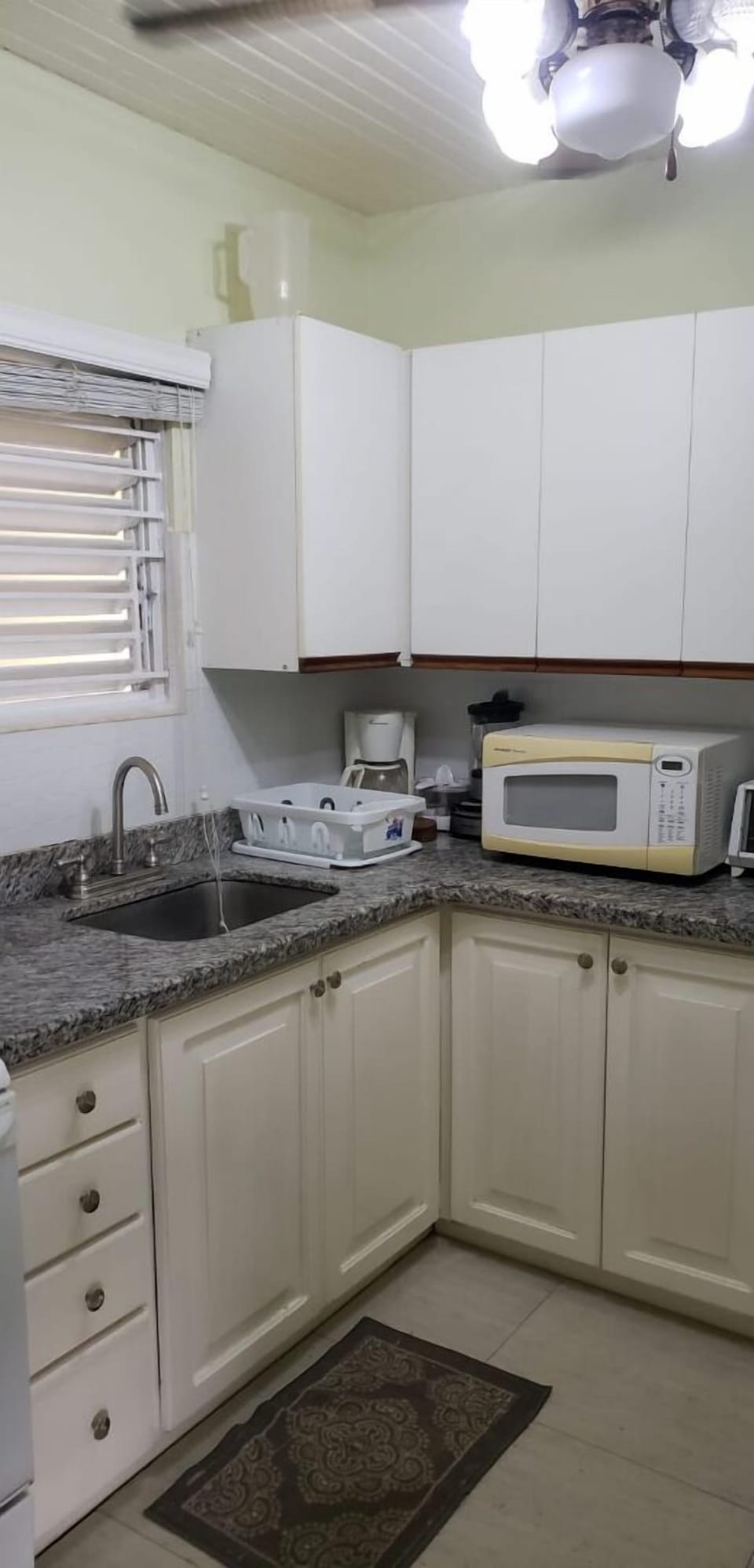 kitchen with utensils,dishes pots and pans etcet.