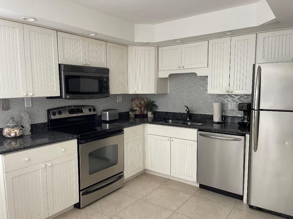 Kitchen that is fully stocked with cookware etc.