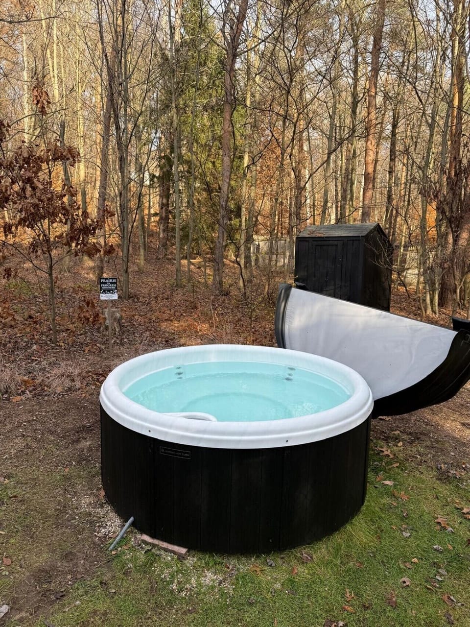 Soak in the Love Inn Hot Tub surrounded by lush the lush forest and nature!