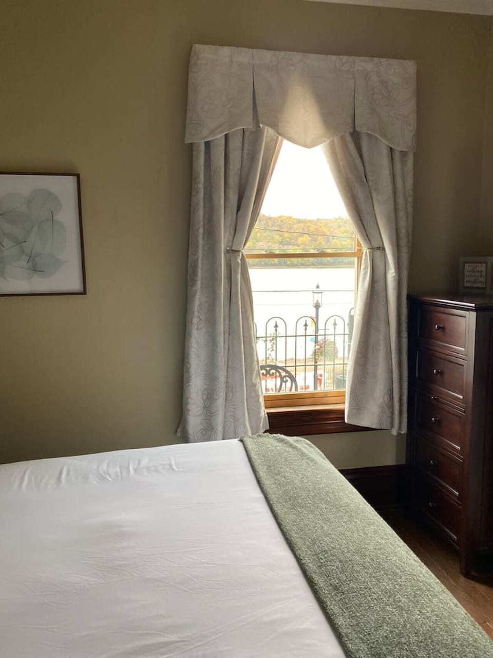 Bedroom 1 with king bed overlooking the Ohio River