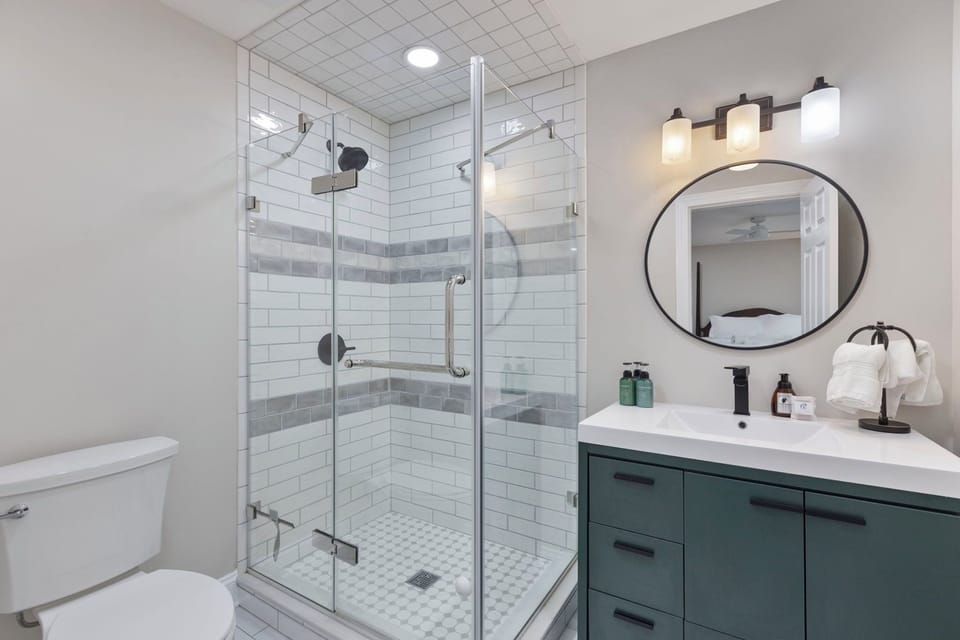 Luxurious ensuite bathroom with a modern walk-in shower.