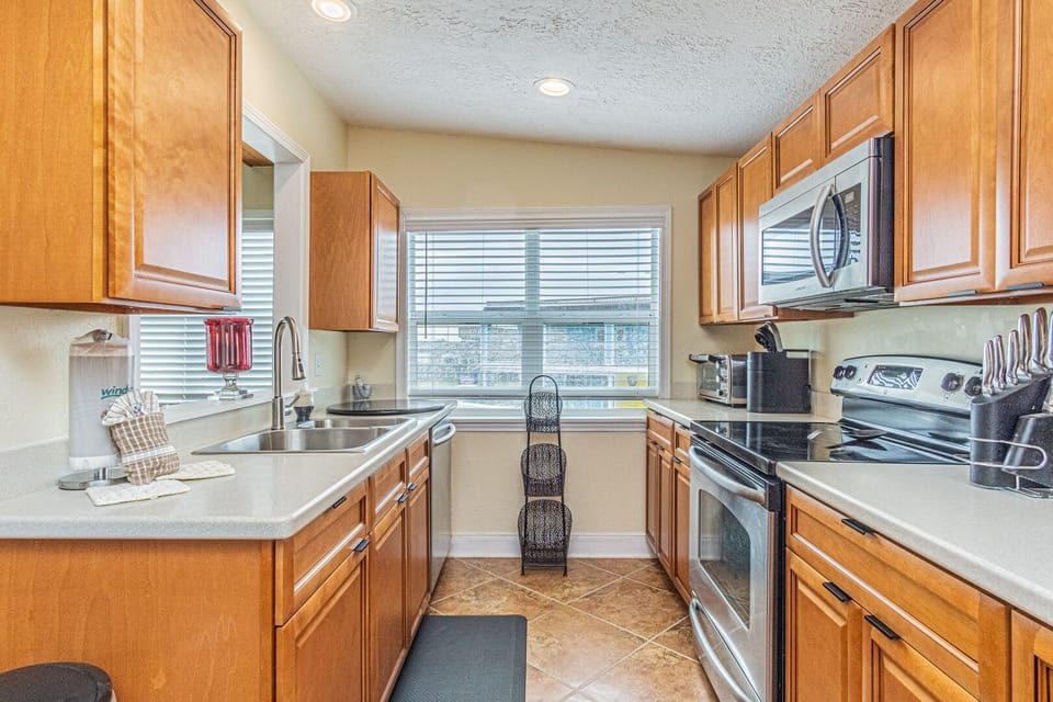 Beautifully remodeled kitchen with full size appliances and everything you need to enjoy a meal in