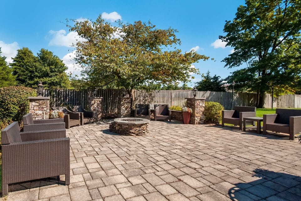 Unwind outdoors around the firepit with comfortable lounge seating.