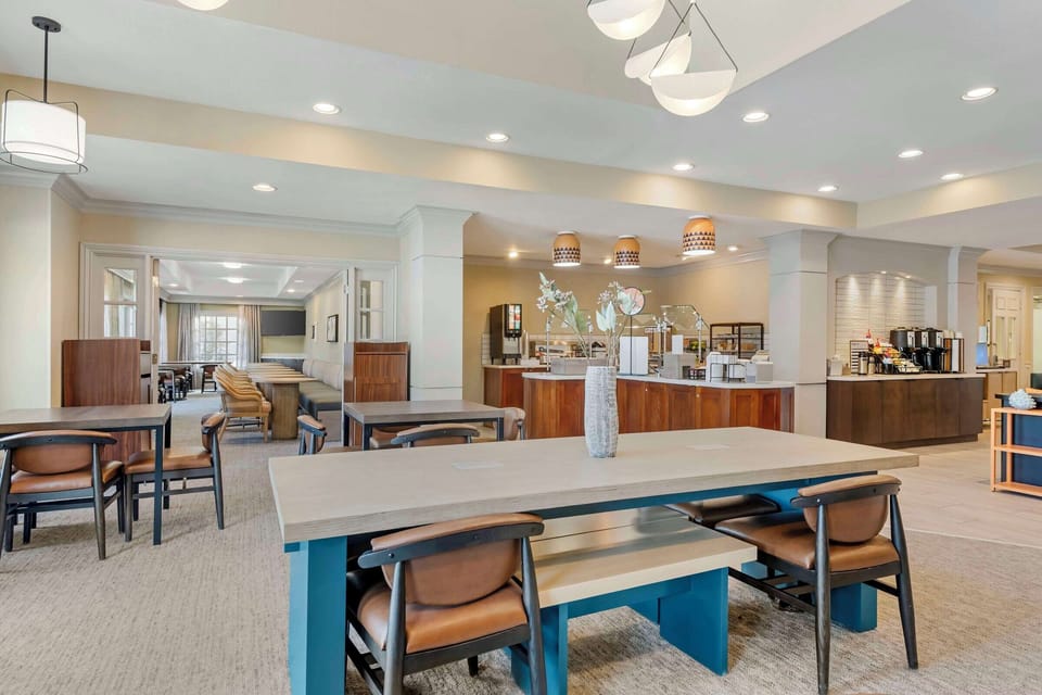 Linger over coffee in a spacious, sunlit gathering area.