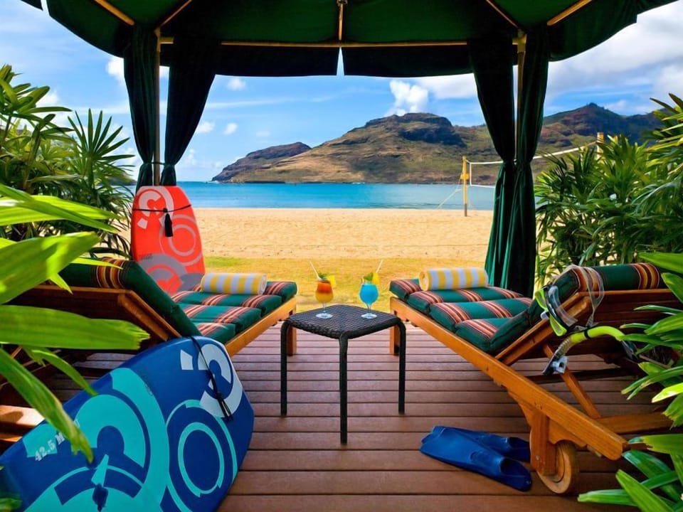 Unwind on shaded loungers with ocean breezes and cocktails.