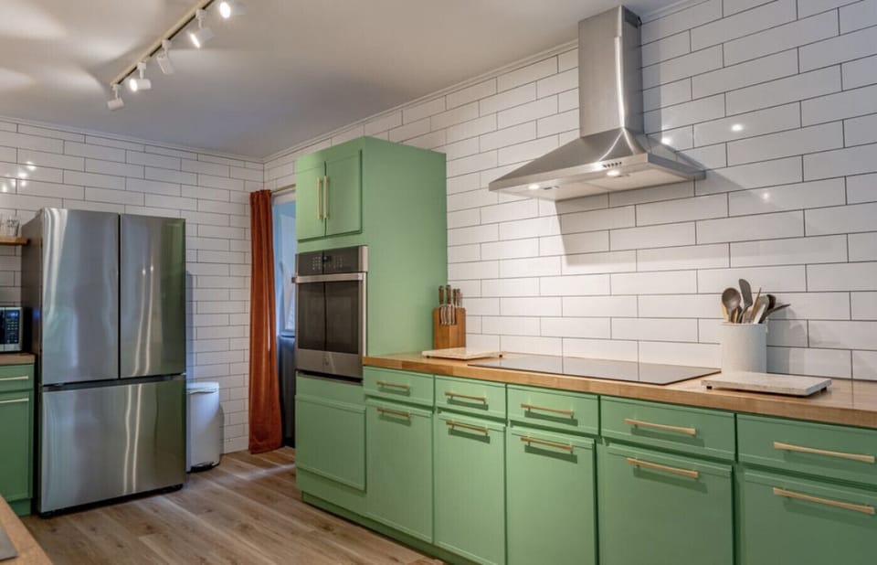 Kitchen includes new stainless steel appliances