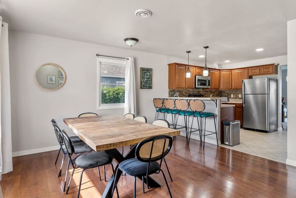 Gather your loved ones around this table and indulge in the pleasure of sharing meals together with an 8-chair dining table