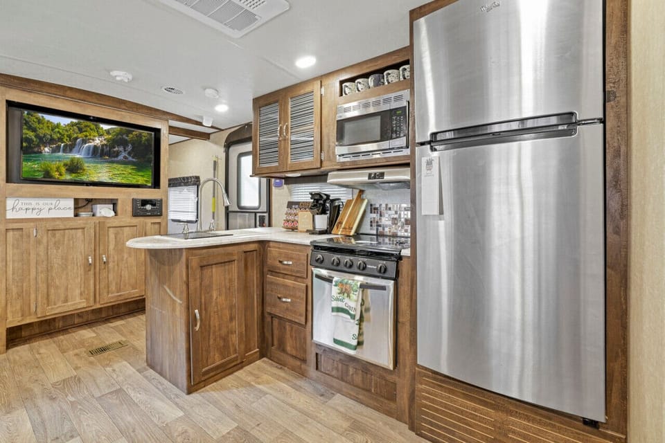 Kitchen with stove, oven and microwave