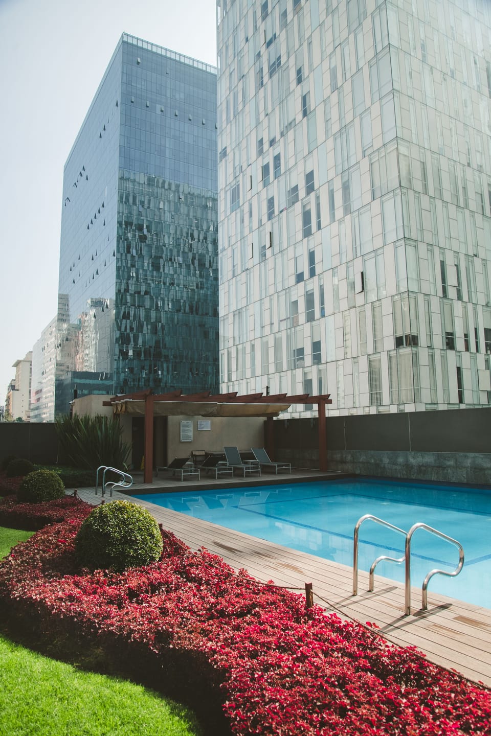 Enjoy the outdoor pool located on the building premises, offering both a serene environment for a swim and a fun-filled atmosphere. Dive in and indulge in refreshing swims while also embracing the playful side of the pool area.