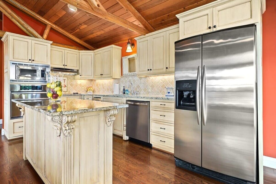 To the right, you'll see our kitchen, which is fully stocked with state-of-the-art amenities.